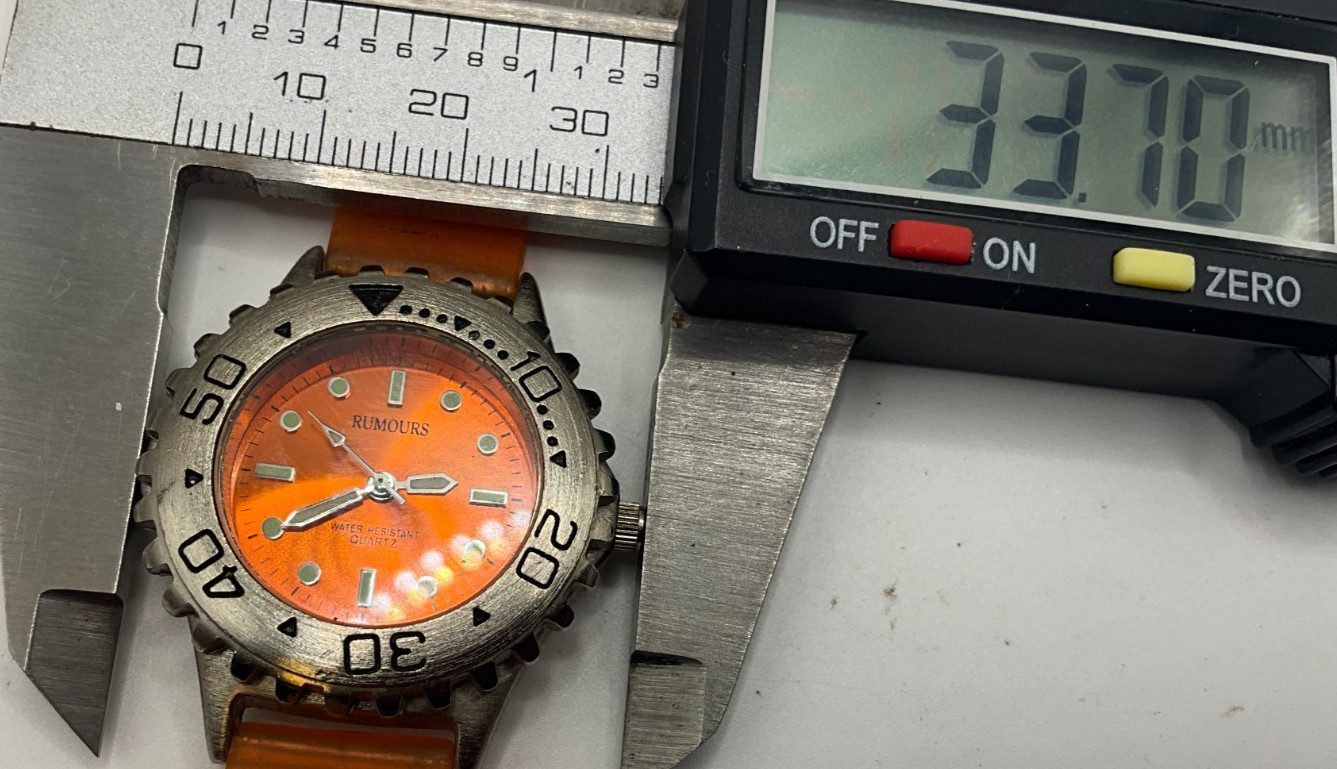 Rarely worn if ever, Rumours womens dive style watch, bold model, new battery