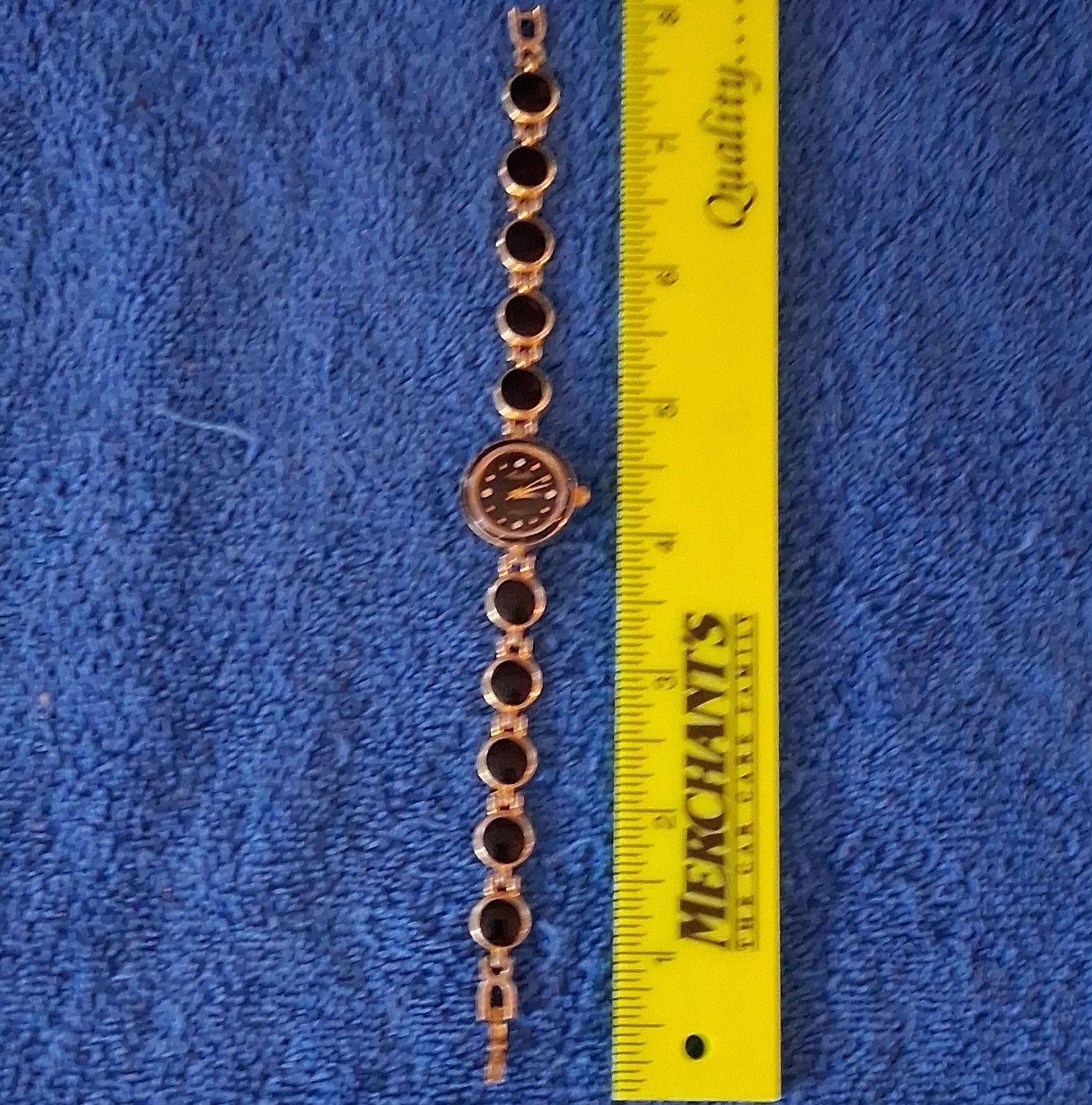 Bulova Women’s Quartz Dress Watch Black Dial Gold-Tone Bracelet Arabic