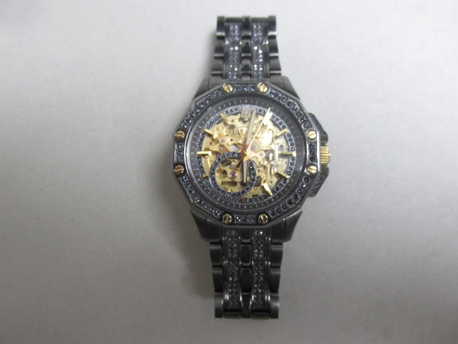 Bulova 98A293 Octava Automatic Gunmetal/Gold Skeleton Dial Men’s SS Watch