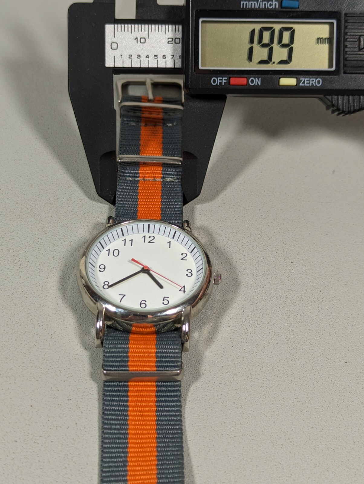 Unisex White Dial Round Silver Tone Case Gray Orange Canvas Band Watch