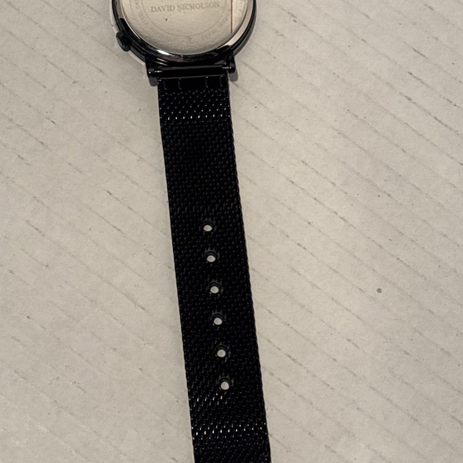 David Nicholson watch black minimalist dial stainless steel mesh