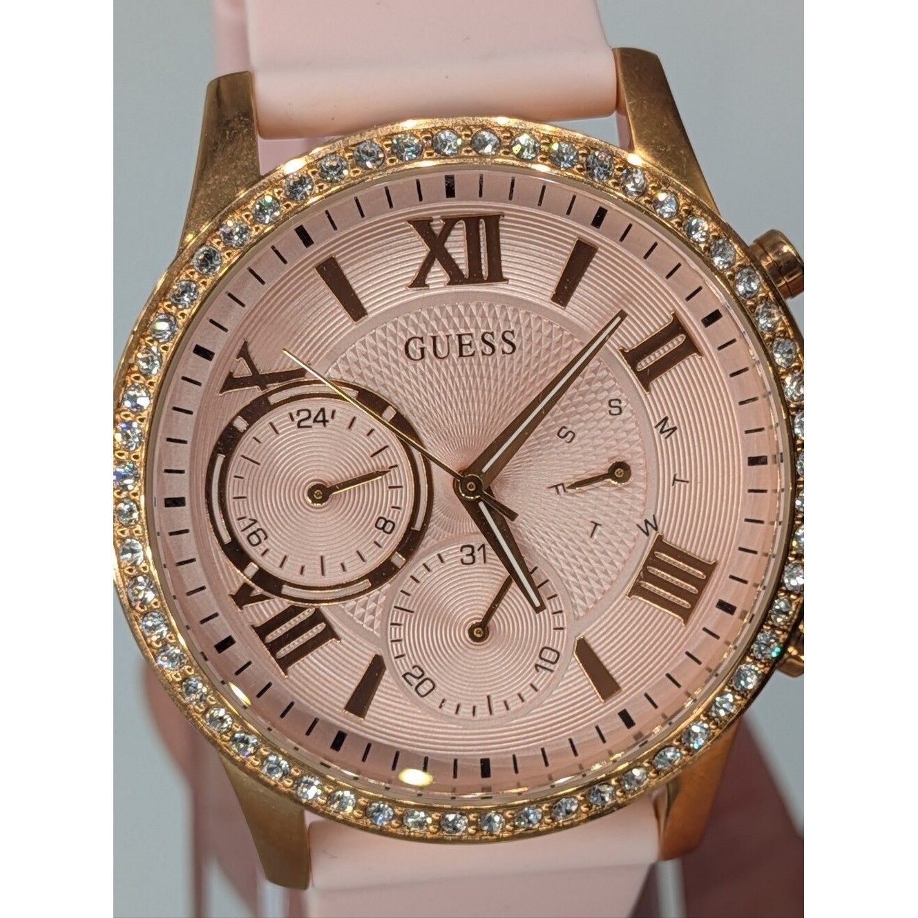 Guess Women’s Watch Solar Rose Gold Pink Dial Rhinestone Bezel U115L32