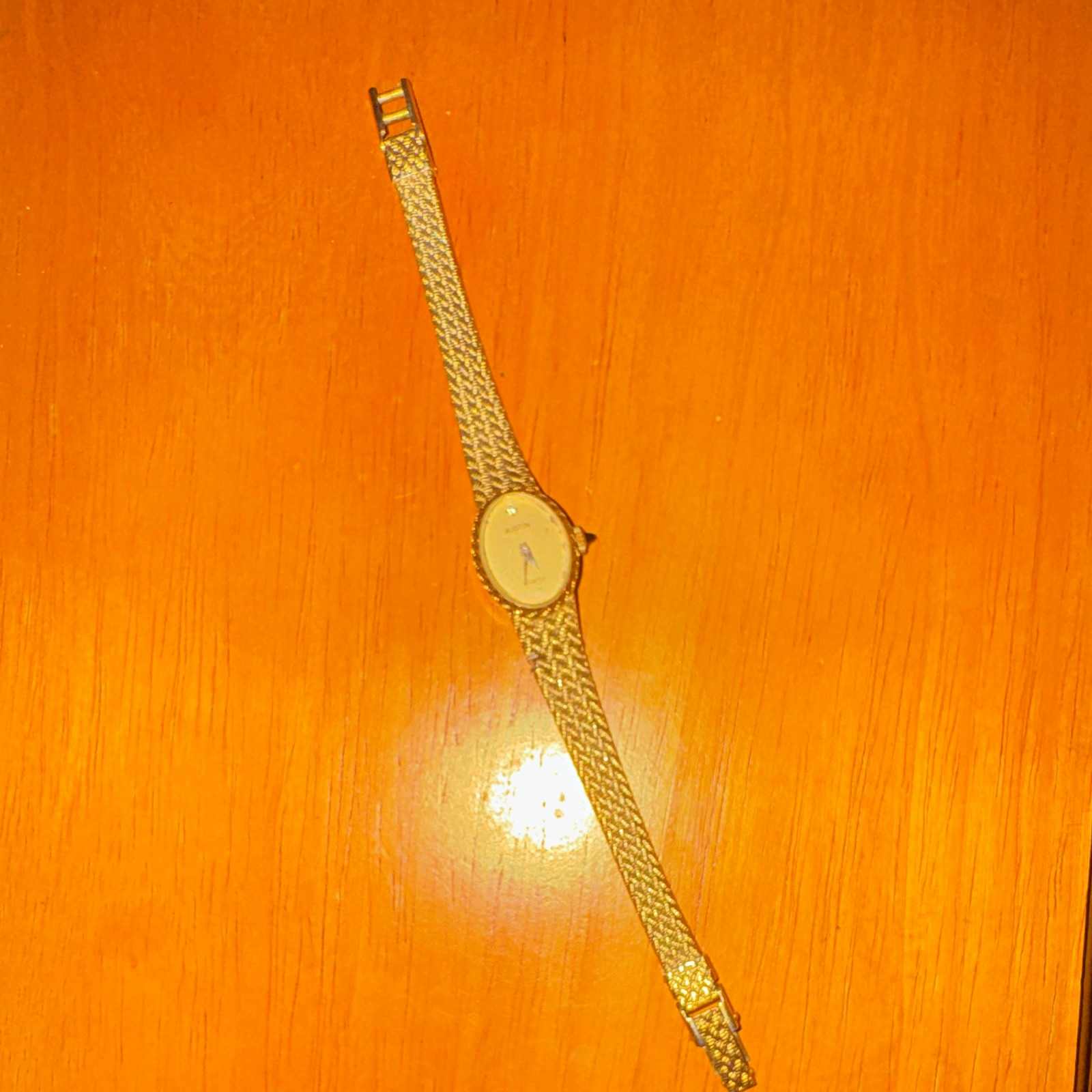 Austin Quartz Women’s Oval Gold-Tone Analog Bracelet Wristwatch