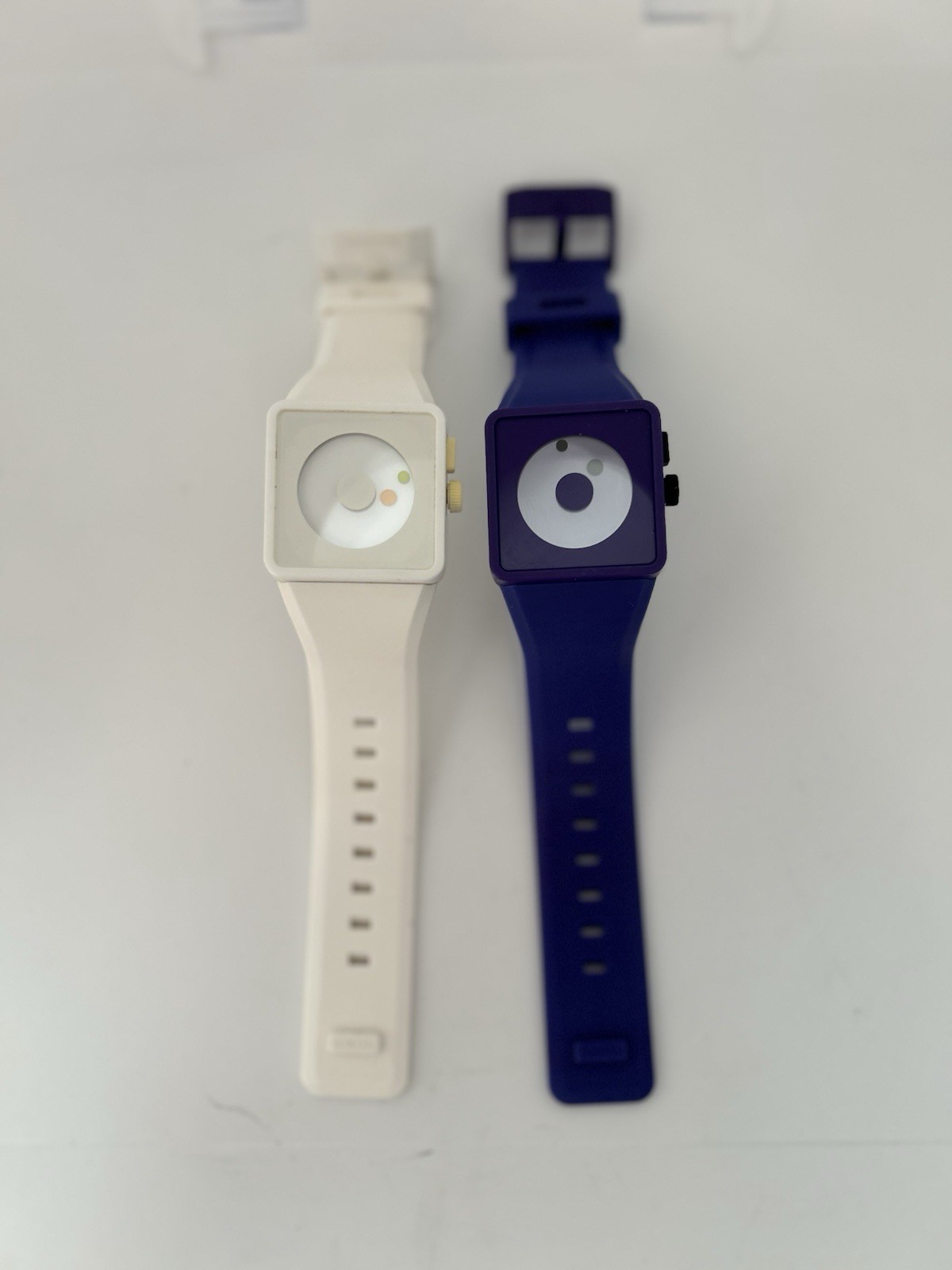 Two Nixon Float On The Newton Watch Purple And Blue And White