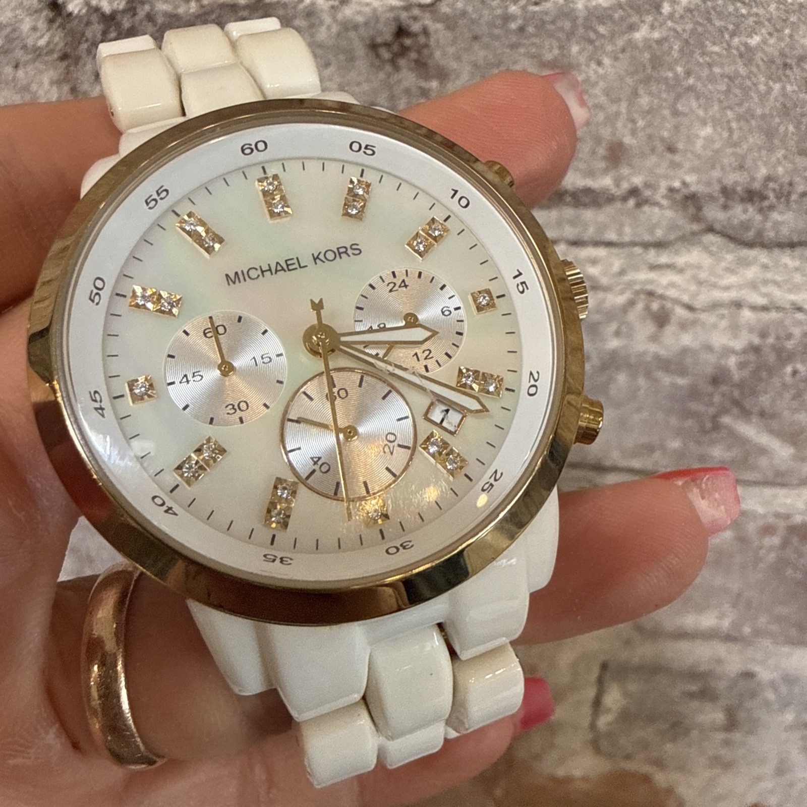This item is a Michael Kors Resin Chronograph Watch, specifically model MK5218.