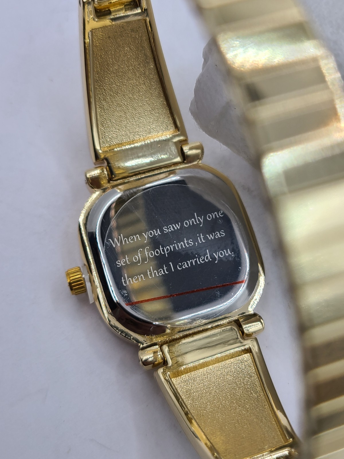DANBURY MINT FOOTPRINTS IN THE SAND GOLD TONE STRETCH BAND WOMEN’S WATCH