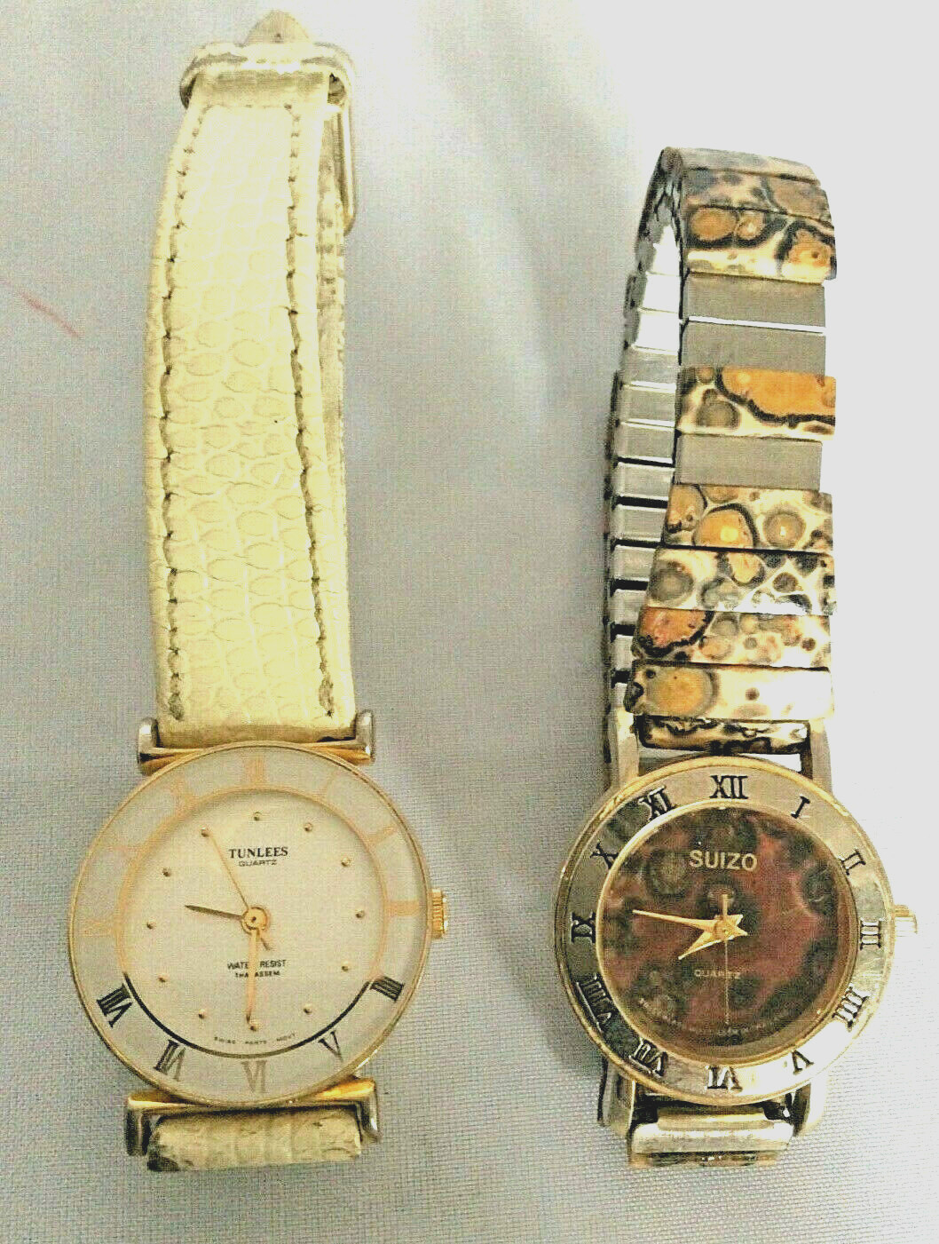 Two Thai-assembled Ladies Watches Jasper Leopard White Leather Gold Tone Hands