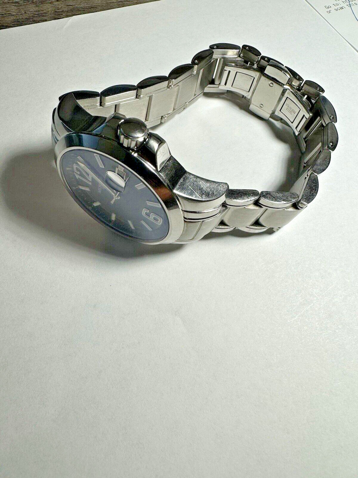 Michaels men’s stainless steel watch with screw down crown, sapphire crystal