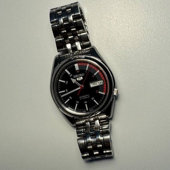 Seiko 5 7S26-01V0 Automatic Men’s Watch Black Racing Dial