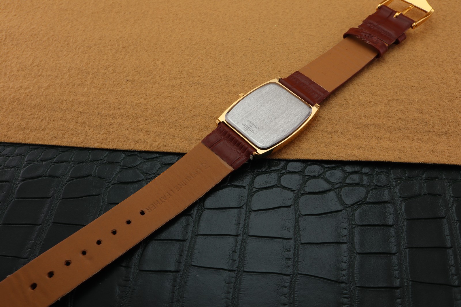 Vintage Seiko Slim Quartz Men’s Wrist Watch Black Dial with Light Brown Strap.