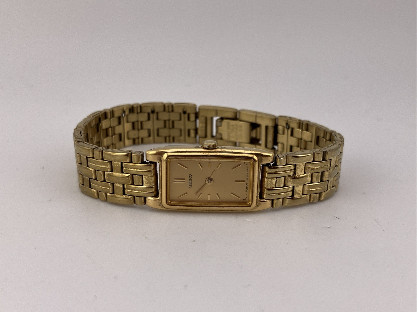 Vtg Seiko Ladies 13mm Watch Gold Tone Gold Tank Dial 5.75″ 2e20-7021 – RUNS