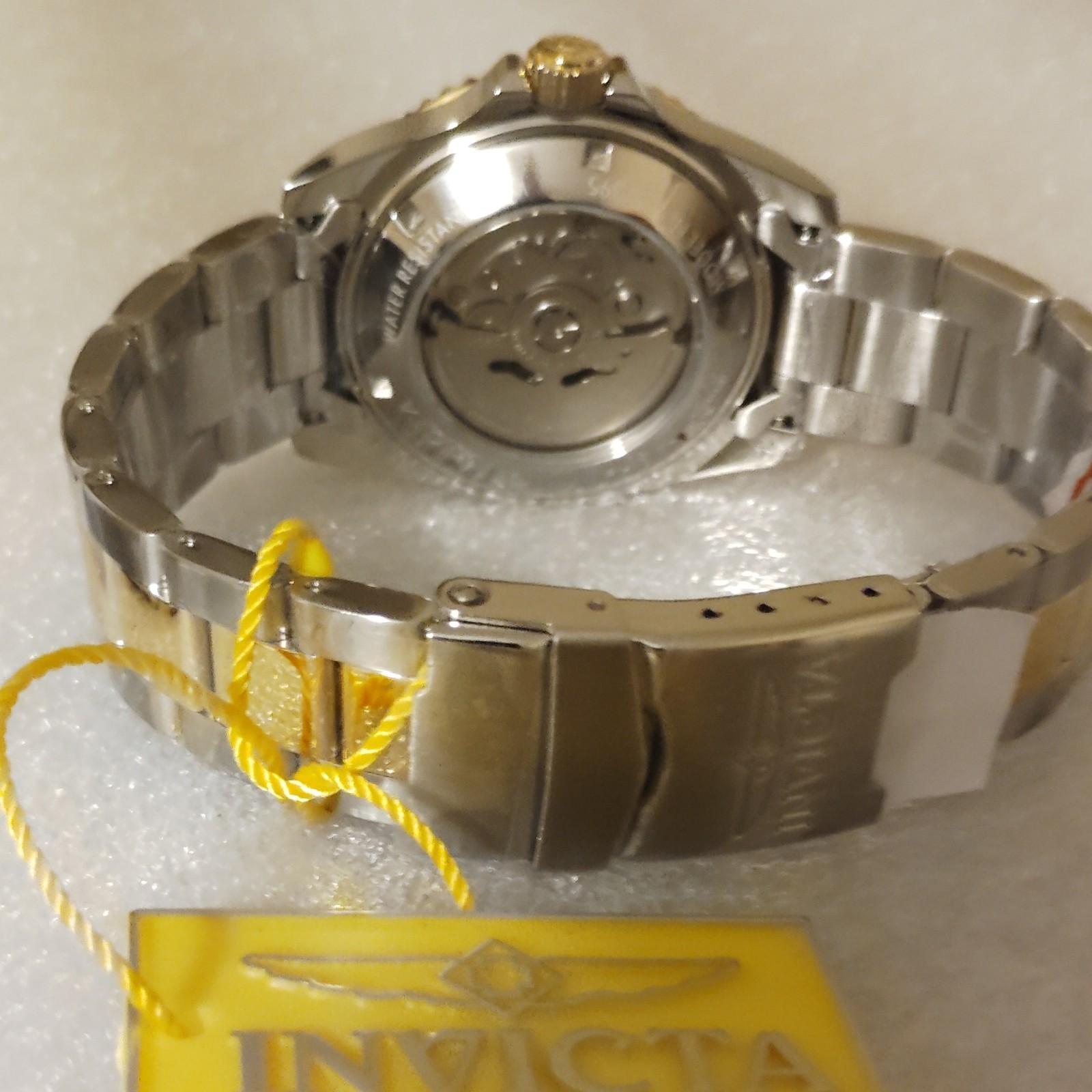 Invicta Men’s Automatic Analog Diver Date Silver Dial Green Bezel Bracelet