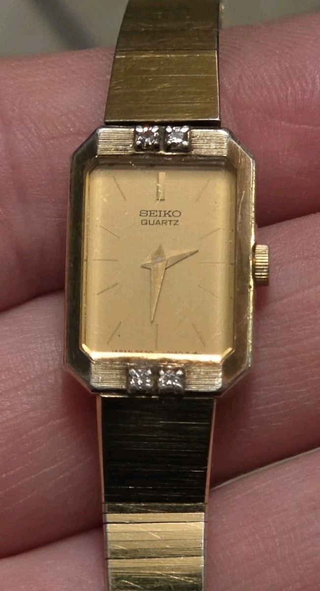 Vtg SEIKO Womens 2E20-5099 Diamond Bezel Gold Dial 14mm Quartz Watch, 7 1/4″