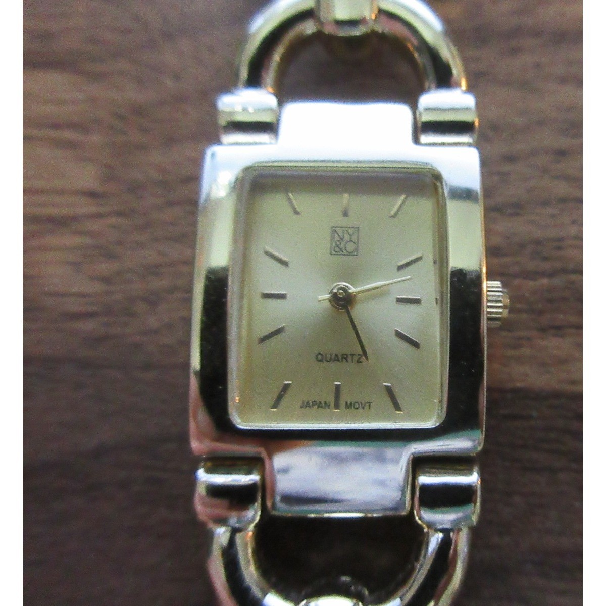 DKNY Gold Tone Women’s Buckle Band Quartz Watch Running see description