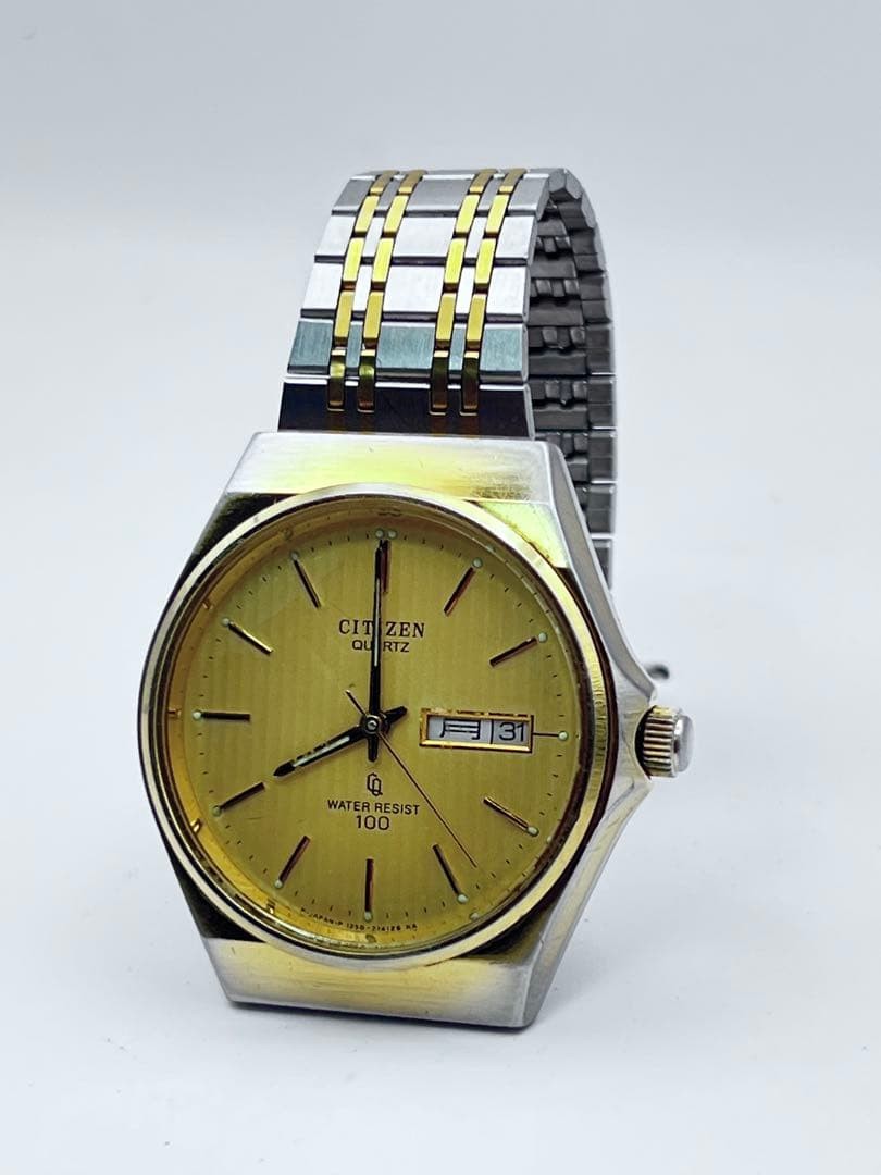 CITIZEN QUARTZ wristwatch, gold and silver case.