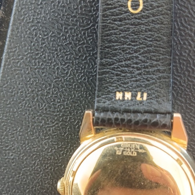 Gruen Autowind Twenty-Three 23J Auto 14 kt gold, 34mm cream, Dial Black Strap
