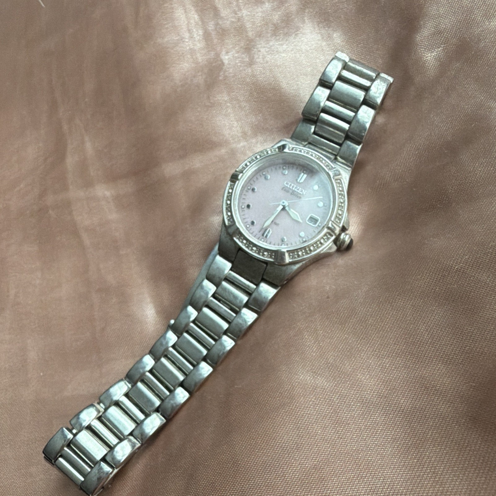 Citizen Eco-Drive Women’s Pink Dial Date Silver SS diamond Bracelet Watch WR100
