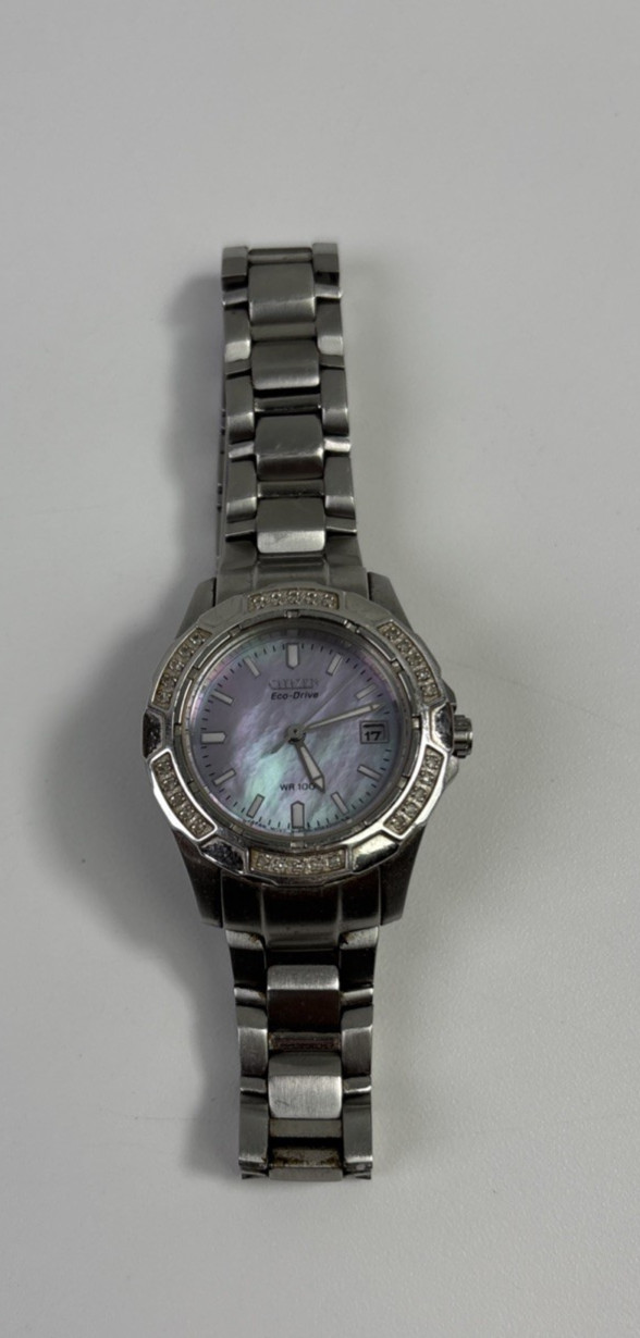 Citizen Eco-Drive Women’s Pink Mother Of Pearl Date Silver Stainless Watch WR100