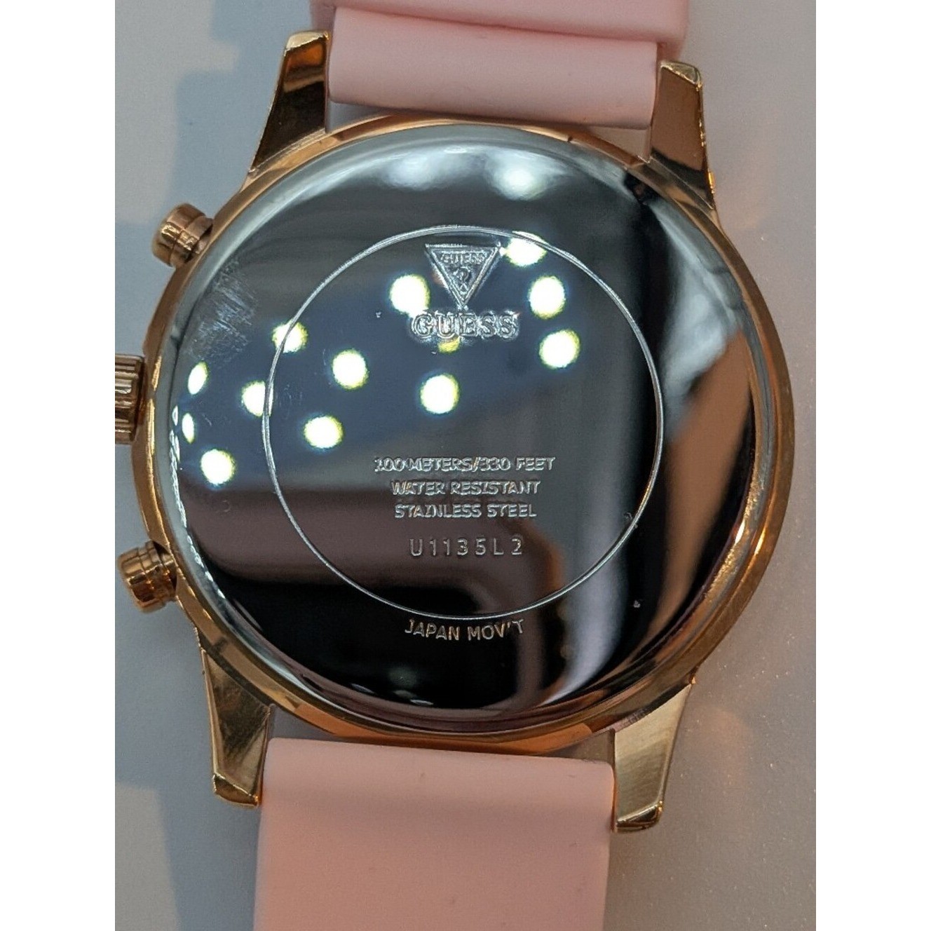 Guess Women’s Watch Solar Rose Gold Pink Dial Rhinestone Bezel U115L32