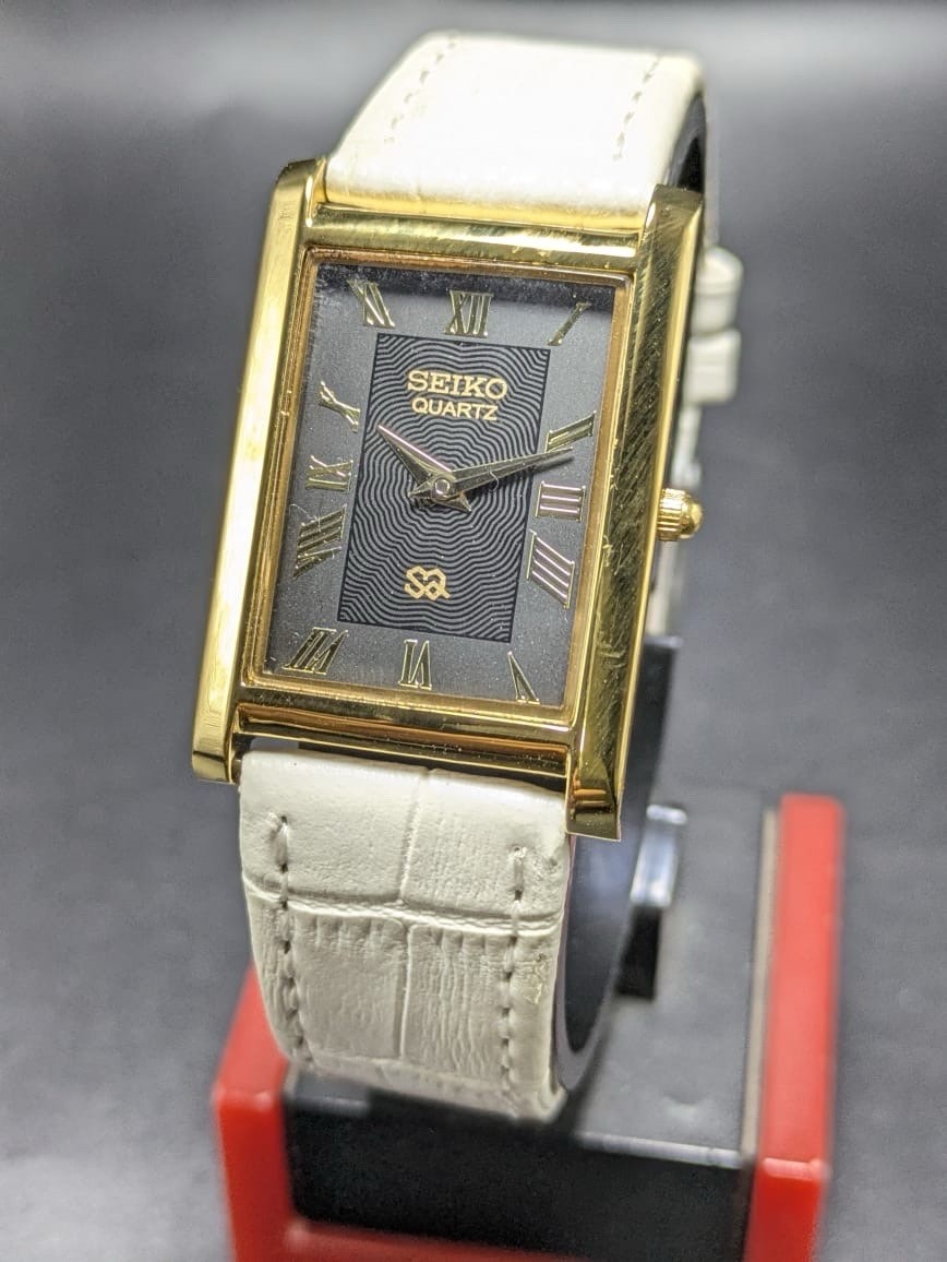 Seiko Quartz Rectangular Black Dial White Band Roman Numerals Men’s Watch