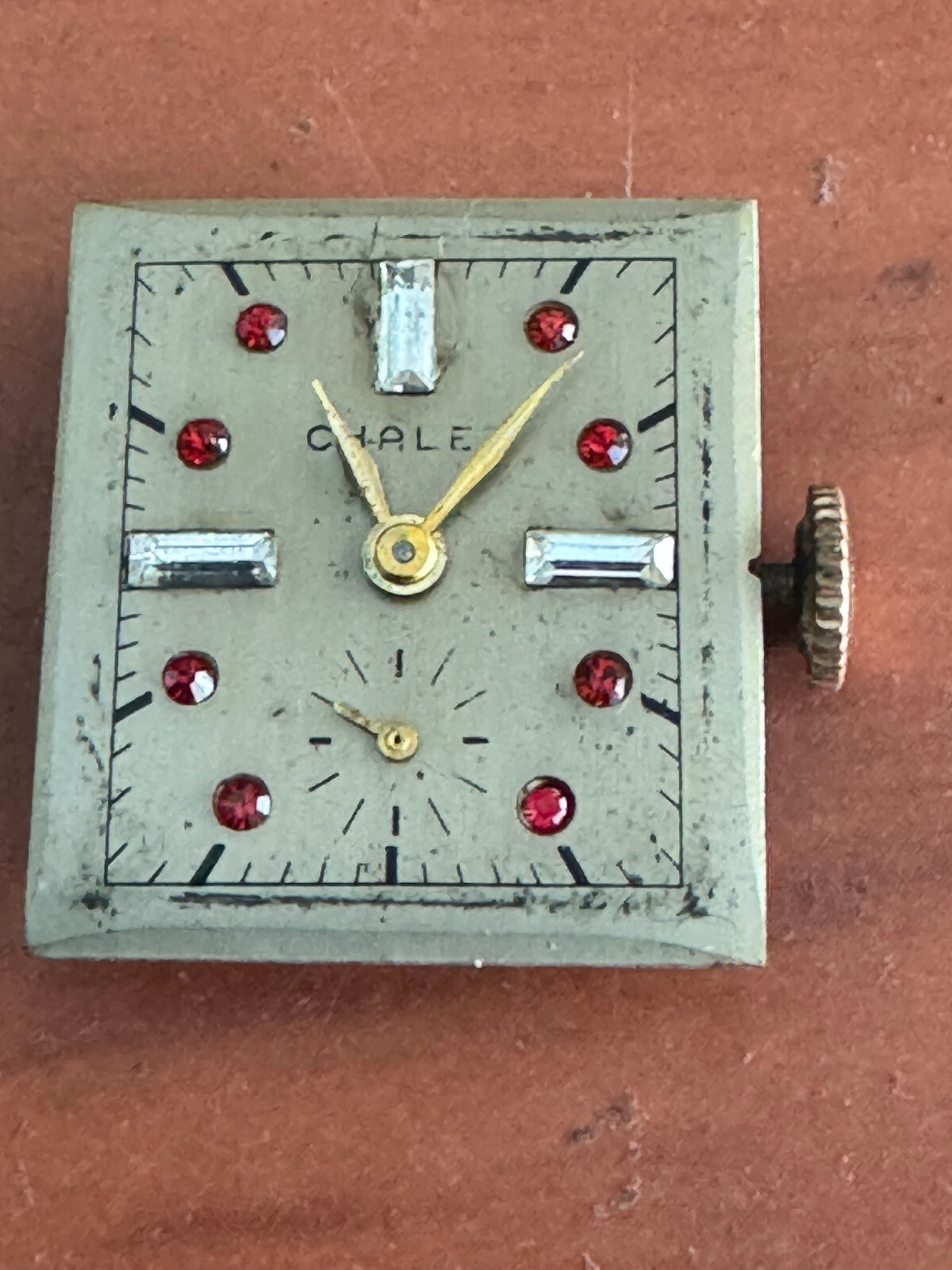 VINTAGE UNISEX CHALET FAUX DIAMOND AND RUBY DIAL WRIST WATCH, KEEPING TIME