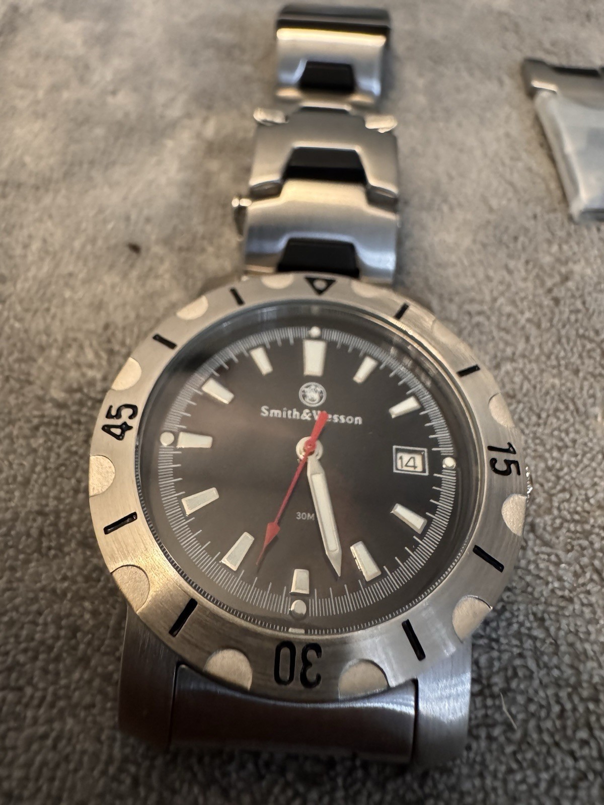 Smith & Wesson Men’s Quartz Watch Black Dial Date 30m SS Bracelet 12-Hour Bezel