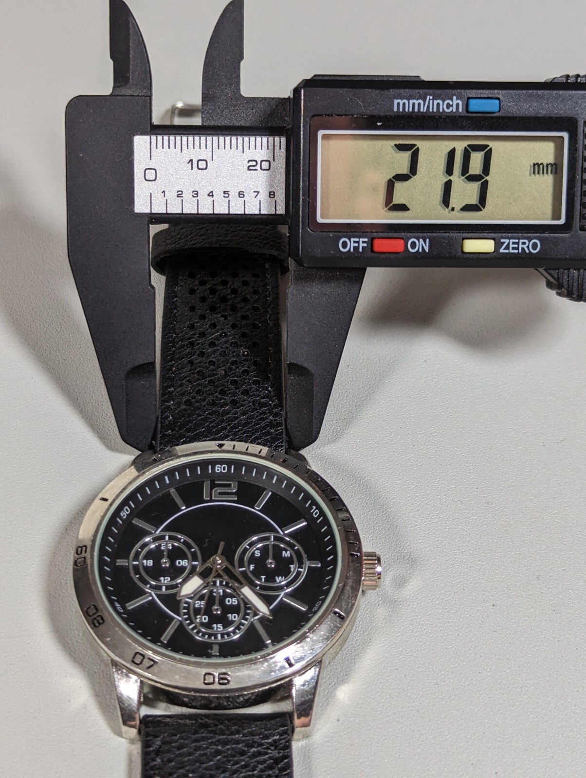 Black Dial Round Silver Tone Case Black Faux Leather Band Watch