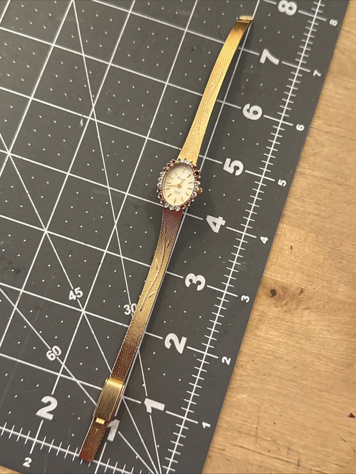 24 diamond ruby Deauville Ladies watch gold plate band new battery