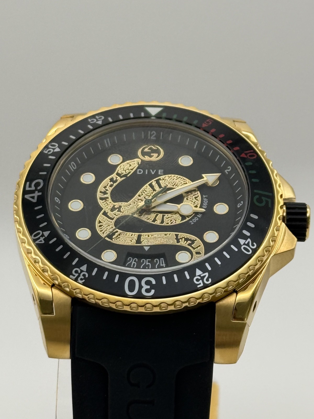 Gucci Dive Black Dial Gold-Tone Rubber Strap 45mm. Men’s Watch YA136219