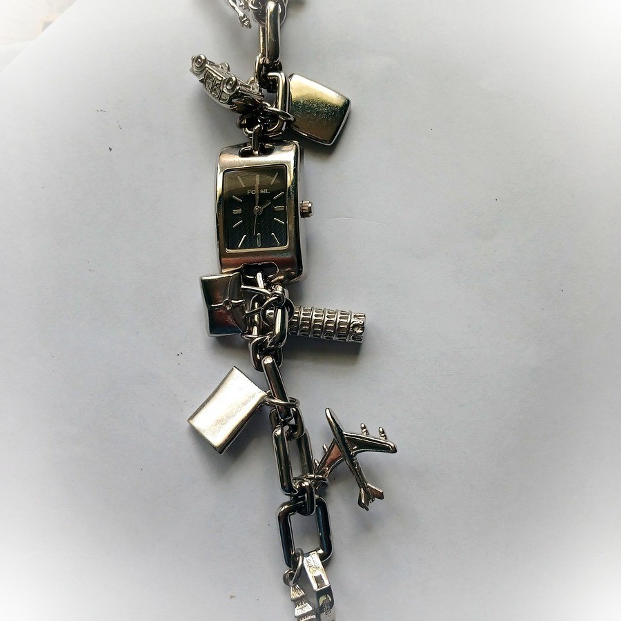 Fossil F2 ES-1133 Silver-tone Charm (Travel Theme) bracelet Ladies’ Watch Quartz