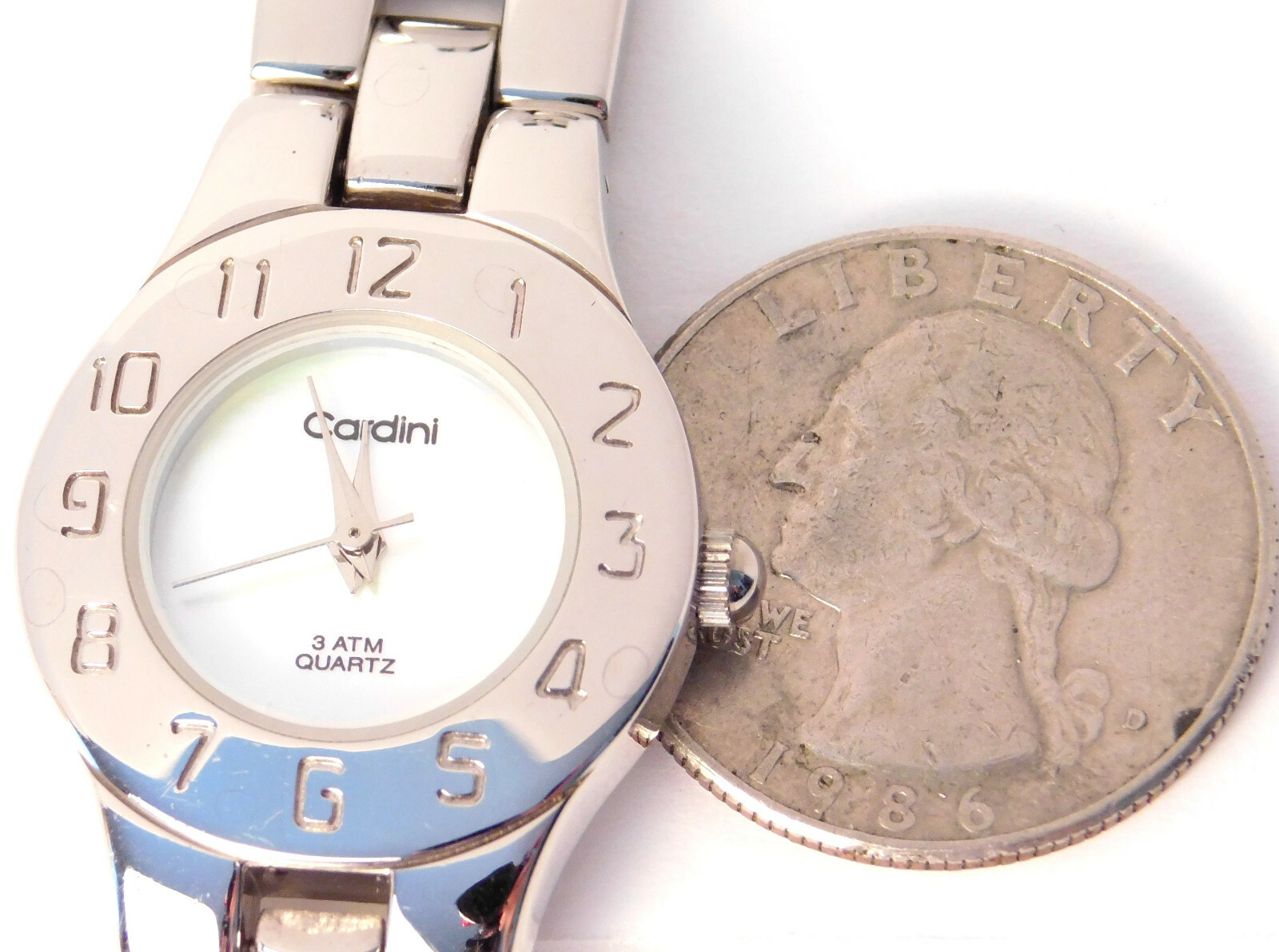 Working Cardini Watch, MOP Face, Hour Marks on Bezel, 7.5″ Band, Good Condition
