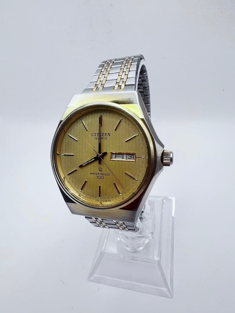 CITIZEN QUARTZ wristwatch, gold and silver case.