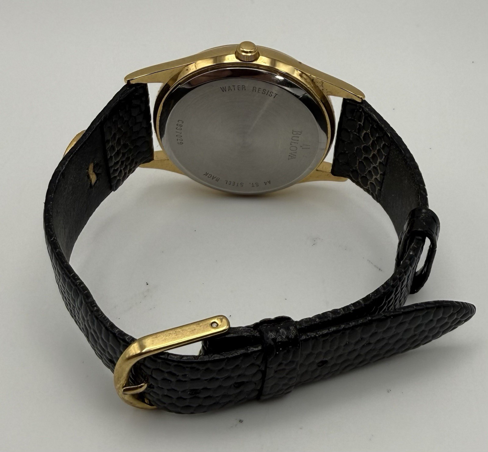 Bulova Caravelle Quartz Vintage Gold Tone Round Dress Watch Black Leather Strap