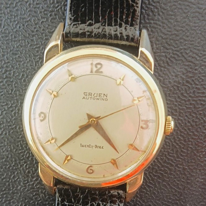 Gruen Autowind Twenty-Three 23J Auto 14 kt gold, 34mm cream, Dial Black Strap