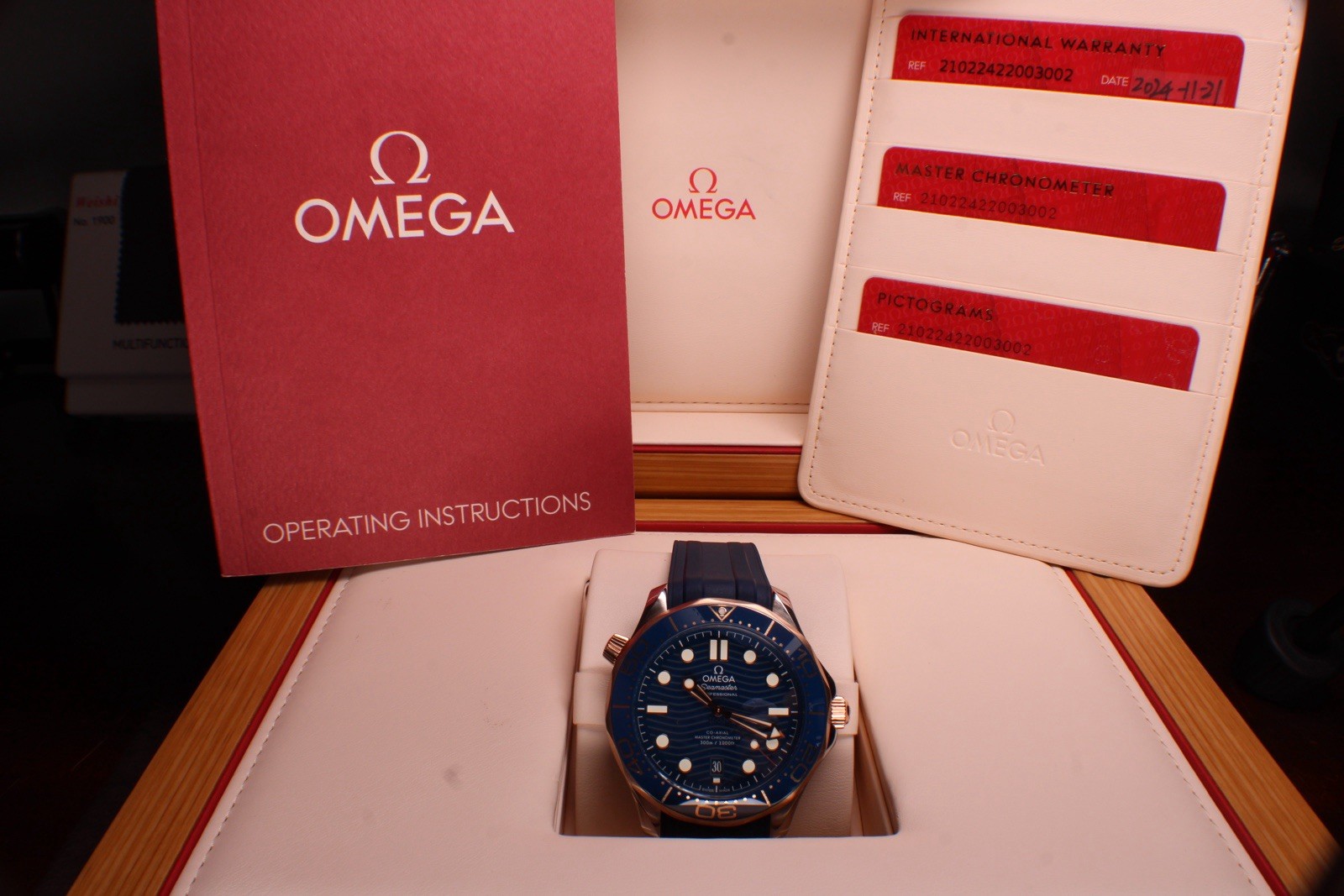 Omega Seamaster 300M Blue Wave Dial Sedna Gold Ceramic Bezel 210.22.42.20.03.002