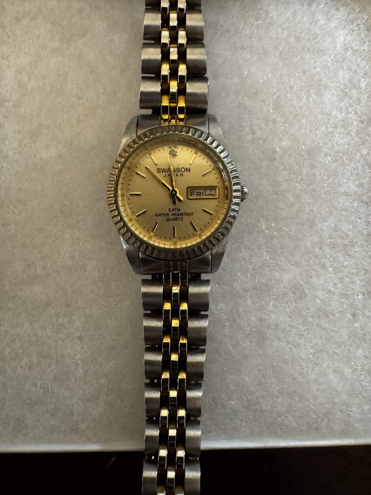 Swanson Quartz Analog Wristwatch Day/Date 50m 5 ATM Two-Tone Bracelet Women’s