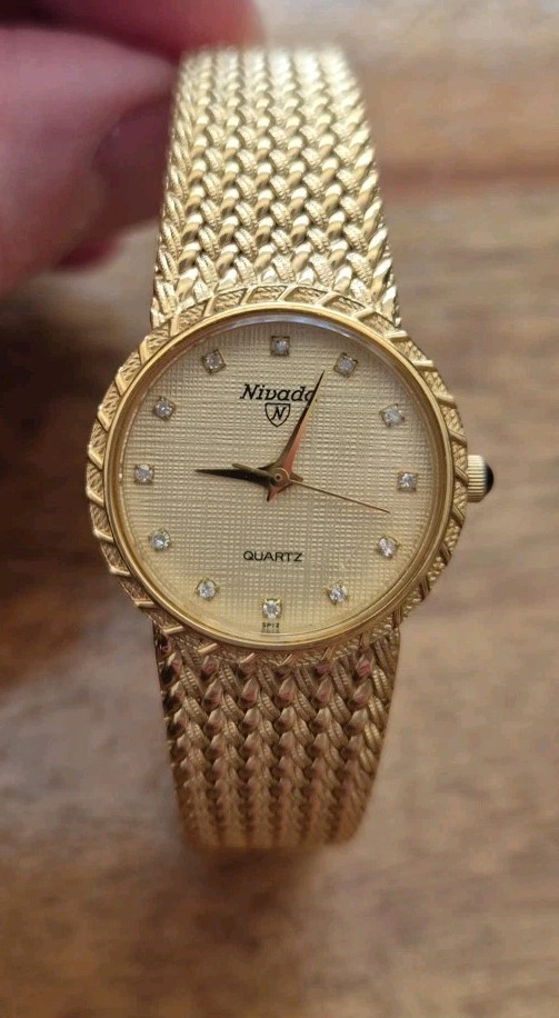 Nivada n-29306sp Diamond gold dial Qz 23mm Women’s