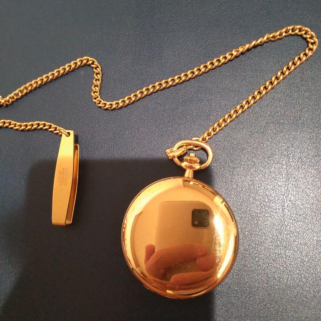 SEIKO pocket watch, gold color, with chain.