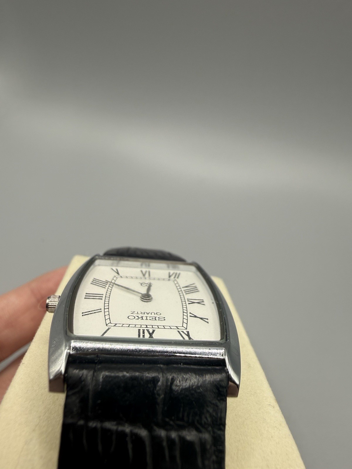 Seiko Quartz Vintage Dress Tonneau Silver Case White Roman Dial Black Leather