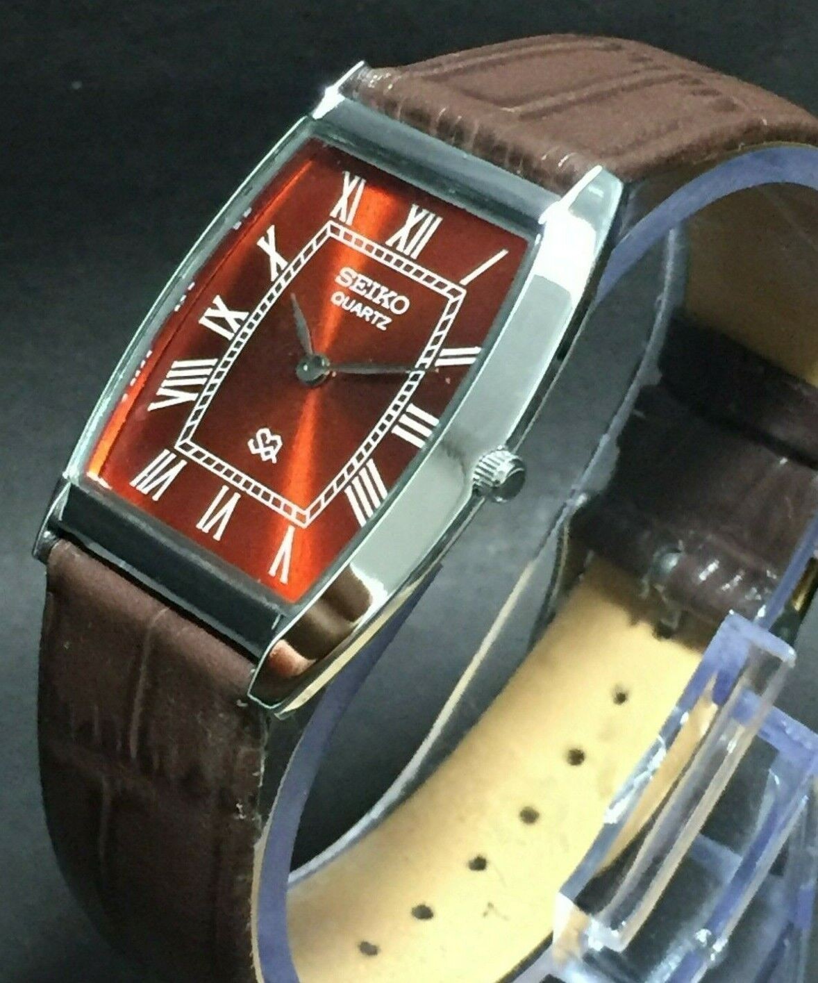 Vintage Seiko Slim Quartz Red Face Japanese Curve Silver 30MM Mens Watch S16