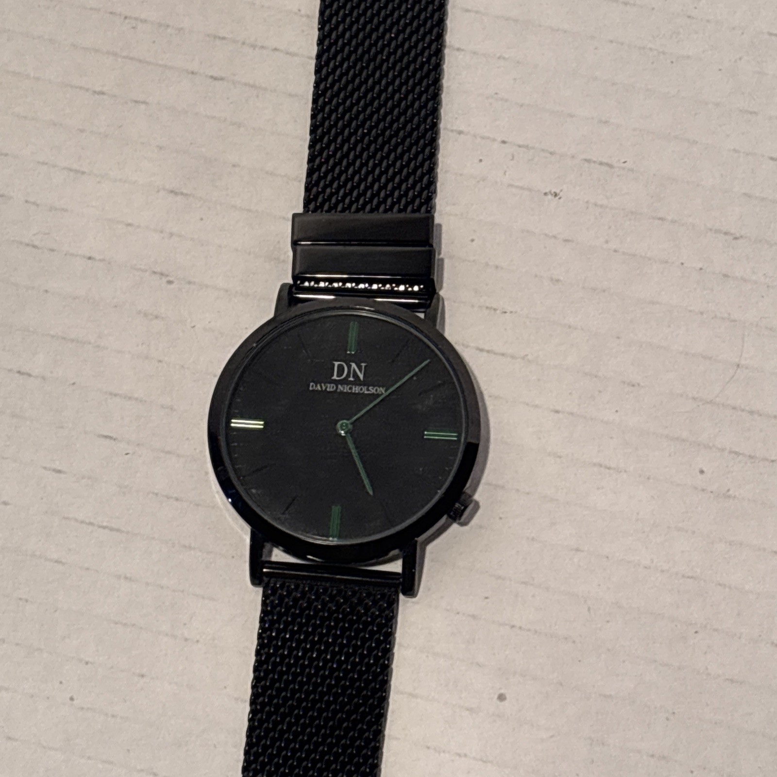 David Nicholson watch black minimalist dial stainless steel mesh