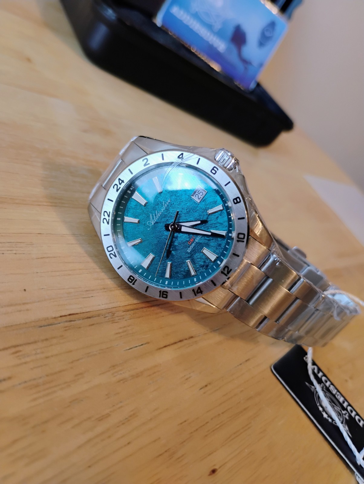 Addiesdive (AD2548) GMT Swiss Quartz Men’s Watch, Blue-Teal Dial, Sapphire, 200m