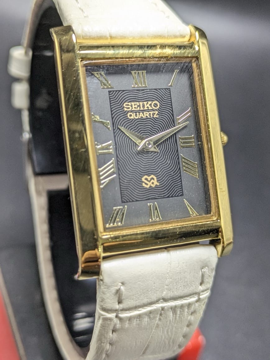 Seiko Quartz Rectangular Black Dial White Band Roman Numerals Men’s Watch