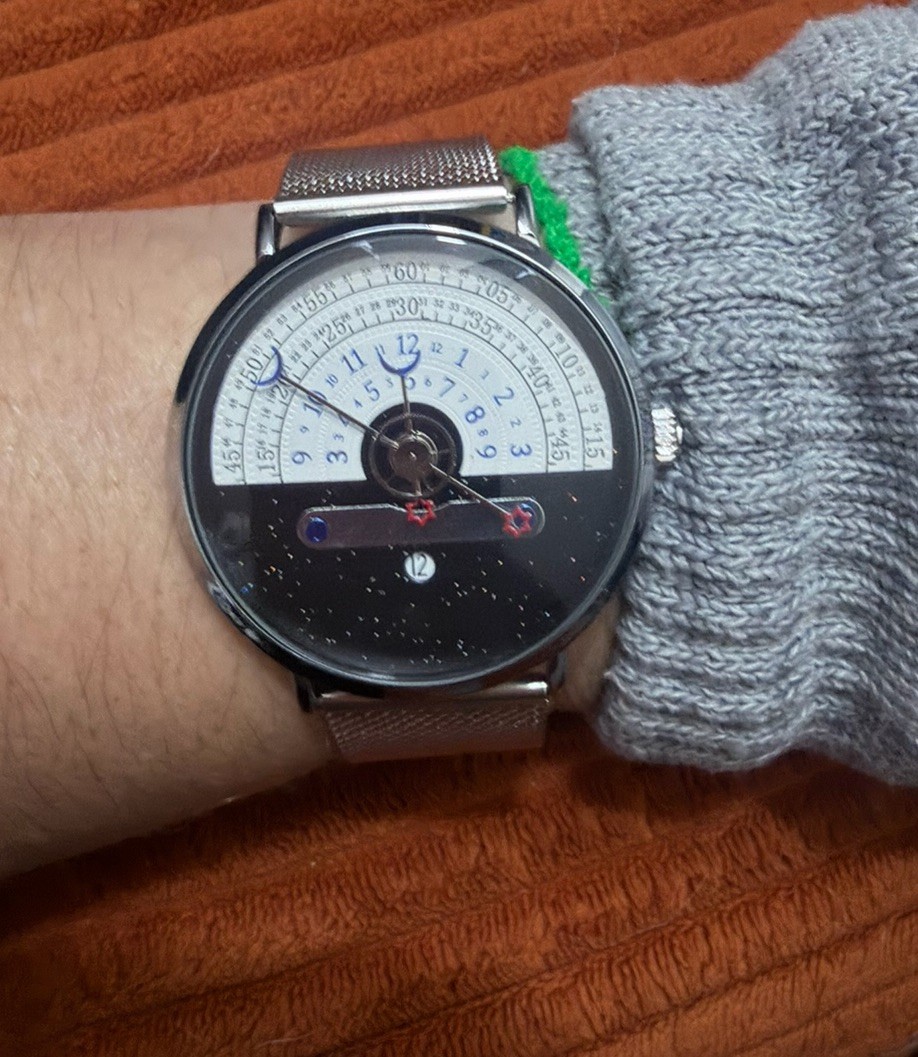 OUKESHI Orbit Dial Quartz Watch Mens Moon and Stars Pointer Steel Mesh Band