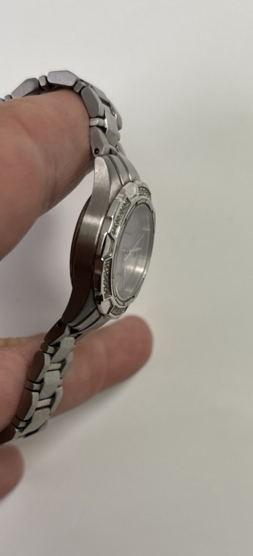 Citizen Eco-Drive Women’s Pink Mother Of Pearl Date Silver Stainless Watch WR100