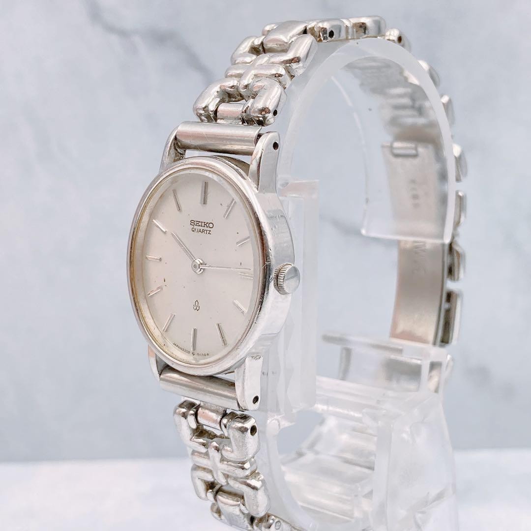 Seiko Ladies Oval Quartz Wristwatch Silver Chain Belt Japan 073681