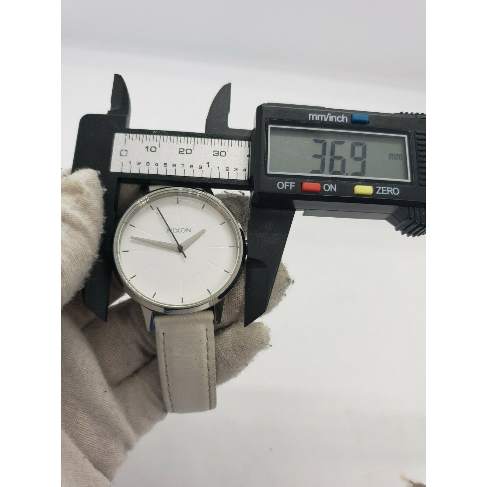 Nixon Moving Out Kengsington Silver Tone Steel Watch with White Leather Band