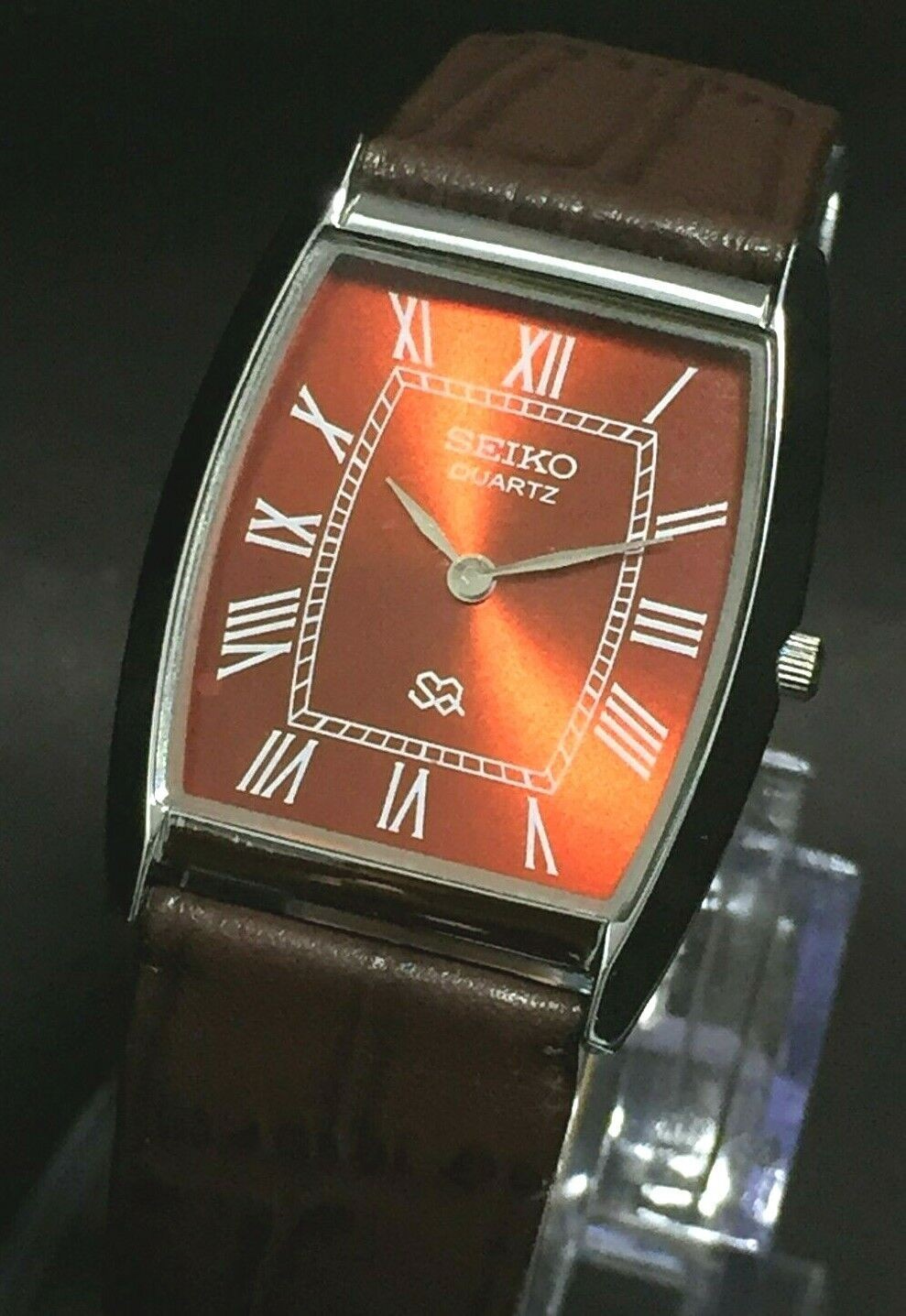 Vintage Seiko Slim Quartz Red Face Japanese Curve Silver 30MM Mens Watch S16