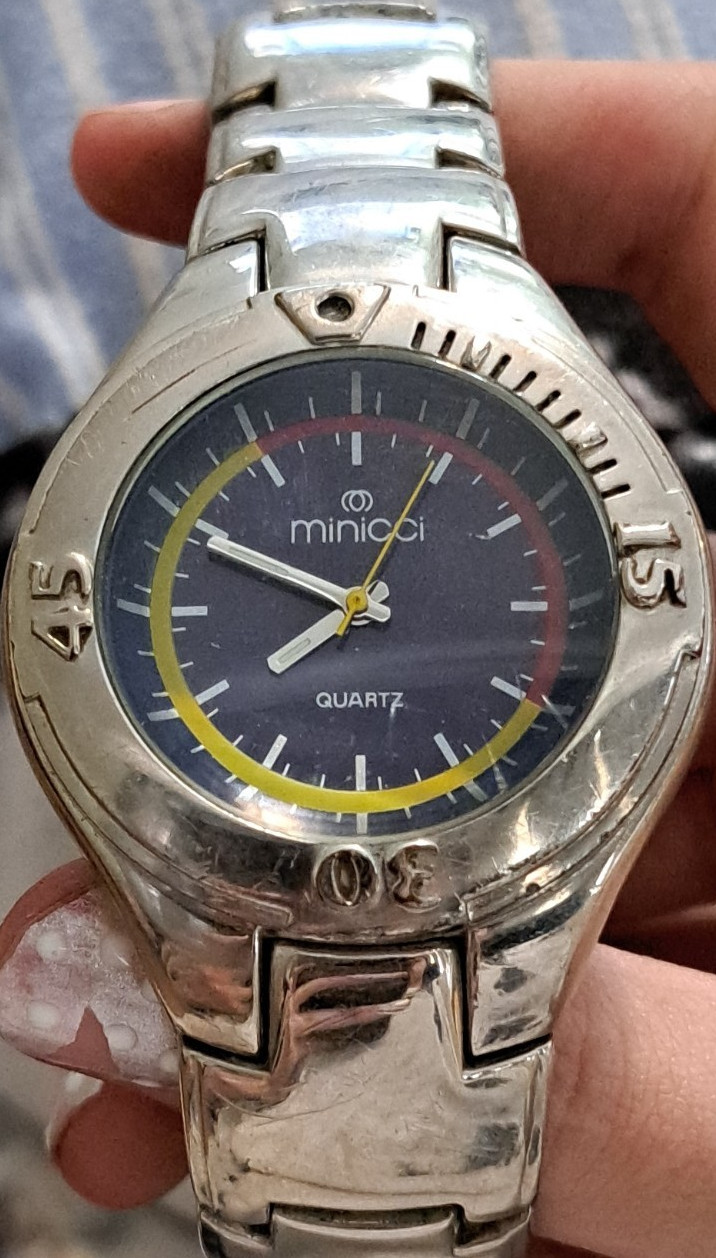 Minicci Quartz Analog Wristwatch Silver Metal Band Black Dial Baton Indexes