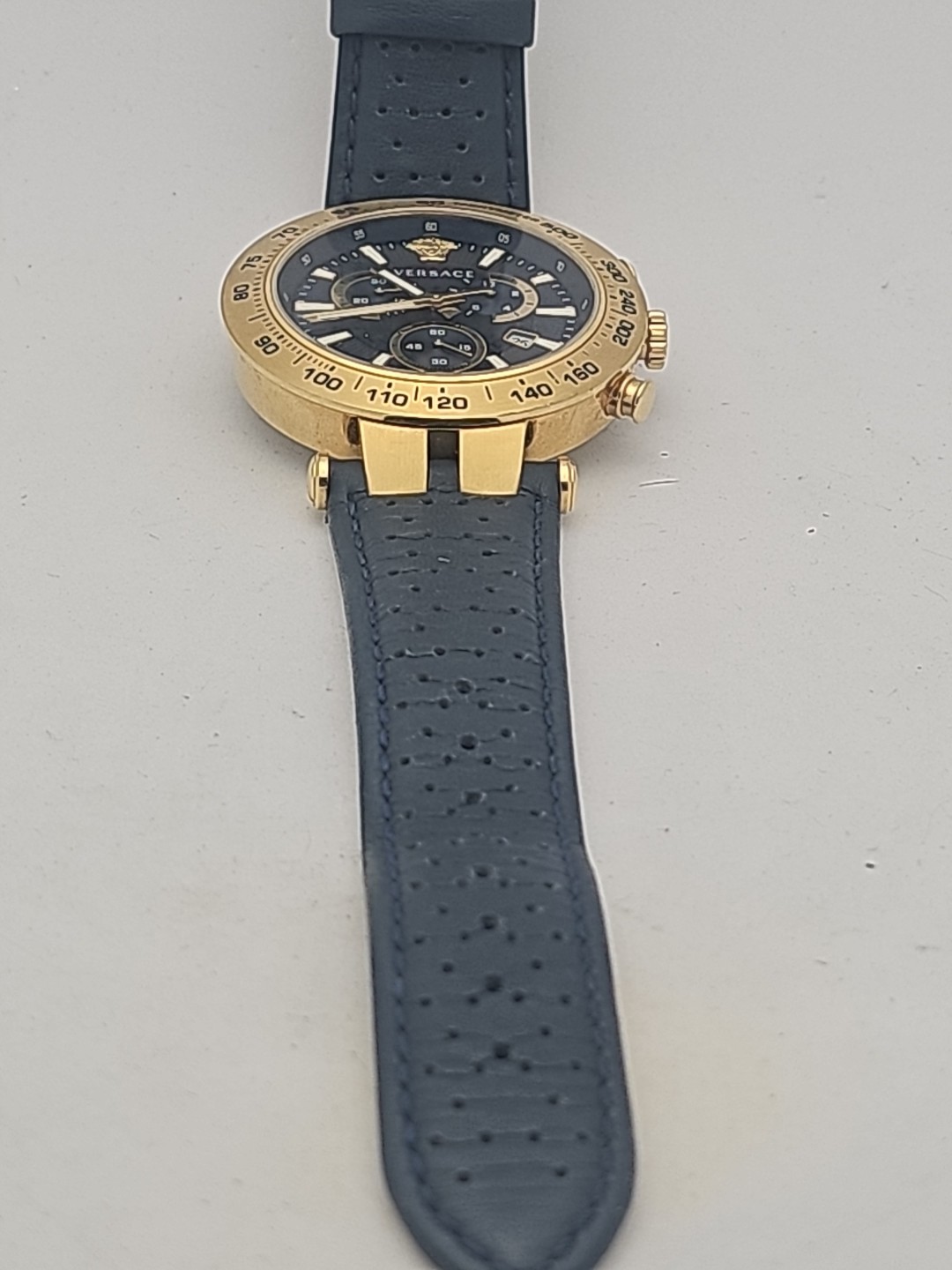 Versace Mens Bold Chrono IP Yellow Gold Bezel Blue Dial 46mm Strap Fashion Watch